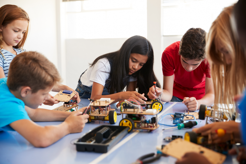 Class of children building robots